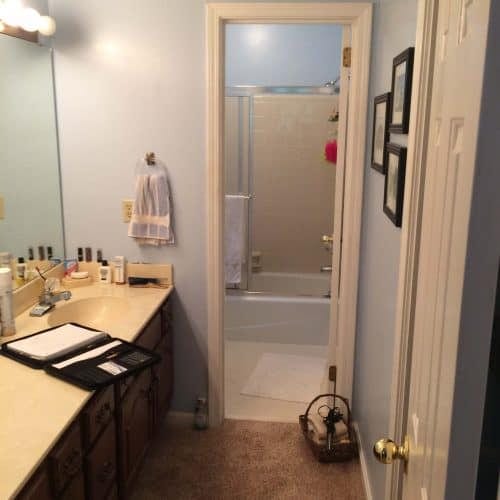 Bright bathroom with shower and bathtub, modern fixtures, and a spacious vanity area, showcasing quality home renovation and bathroom remodeling services by My Contracting Guy.