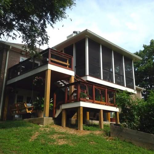 Back of house after deck and fireplace add on