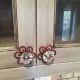 Delightful kitchen cabinet knobs with decorative flower design and glass accents, perfect for enhancing home interior decor and cabinetry aesthetics.