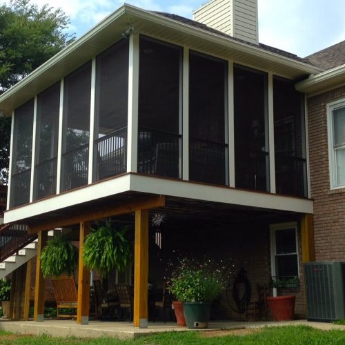 Back of house after deck and fireplace add on
