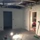 Newly renovated interior space under construction by My Contracting Guy, showcasing drywall installation, electrical wiring, and ongoing finishing work for residential or commercial contracting projects.