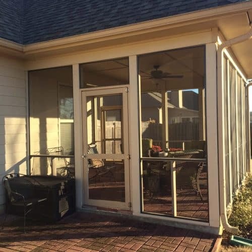 Beautiful screened porch addition with clear panels, perfect for outdoor living and bug protection. Expertly built by My Contracting Guy, enhancing home value and outdoor comfort.
