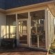 Beautiful screened porch addition with clear panels, perfect for outdoor living and bug protection. Expertly built by My Contracting Guy, enhancing home value and outdoor comfort.