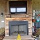 Outdoor fireplace on newly added on porch